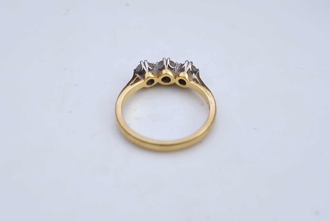 A three-stone diamond ring
